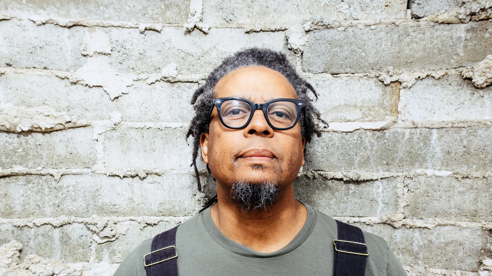 Jeff Parker in front of a brick wall