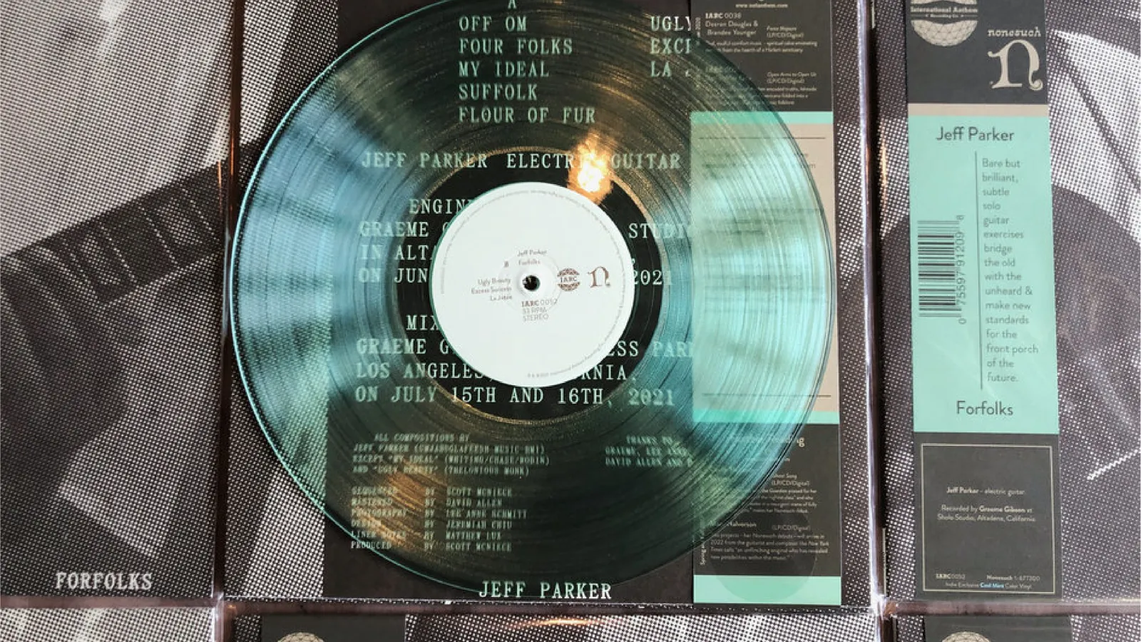 Forfolks album shots, a clear vinyl LP and packaging